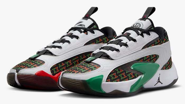 Side view of Luka Doncic's white, black, and green Jordan Brand sneakers.